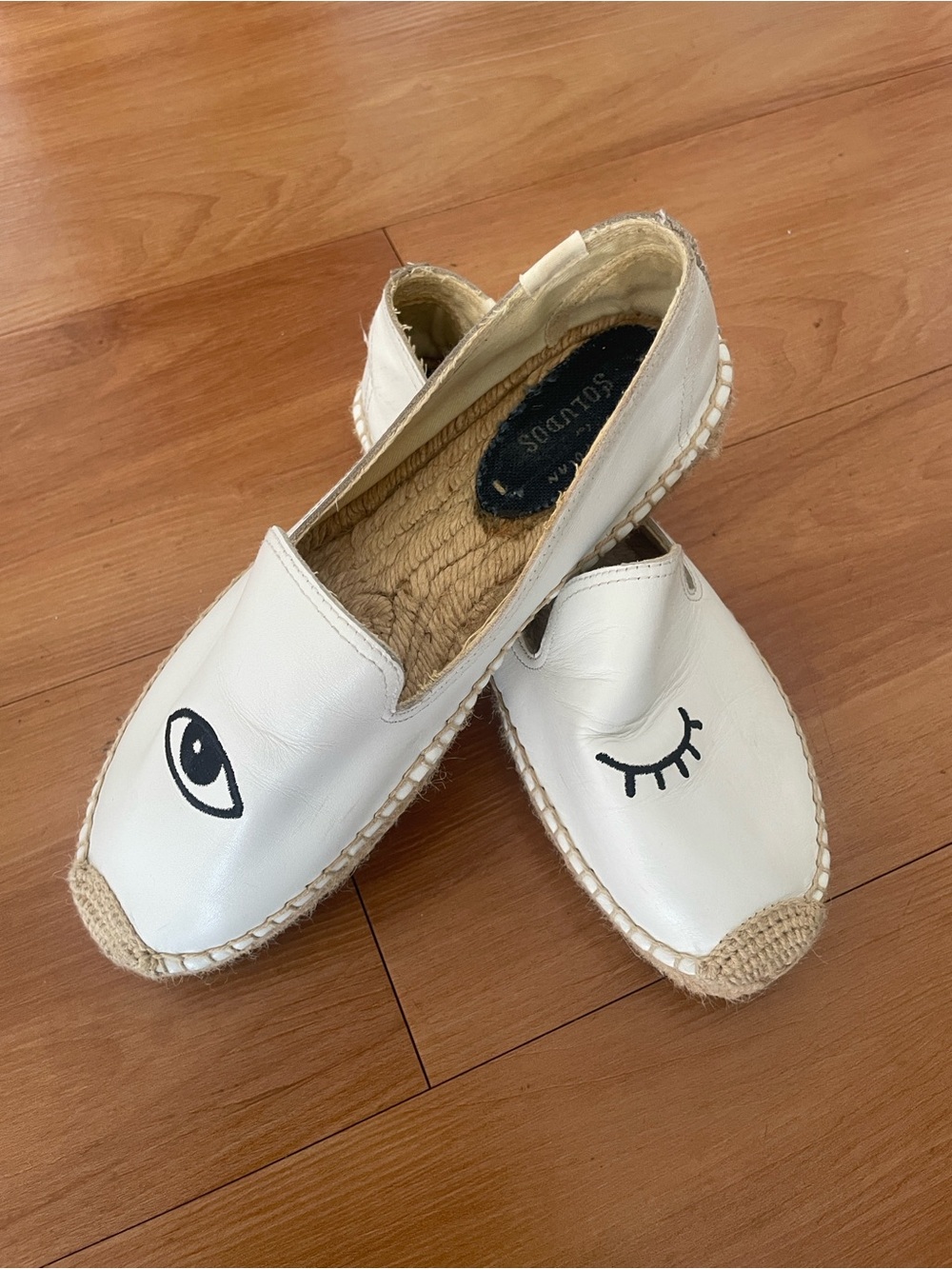 Good condition White Espadrille Slip-Ons with Eye Motif